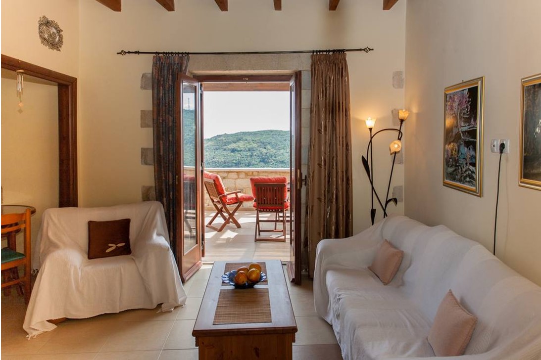 living room with view- traditional stone built villa in chania crete - homes for sale in chania